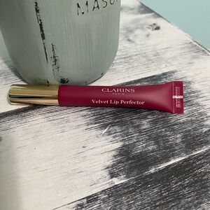 Clarins Velvet Lip Perfector in “04 Velvet Raspberry”